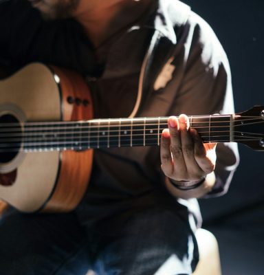 person playing guitar