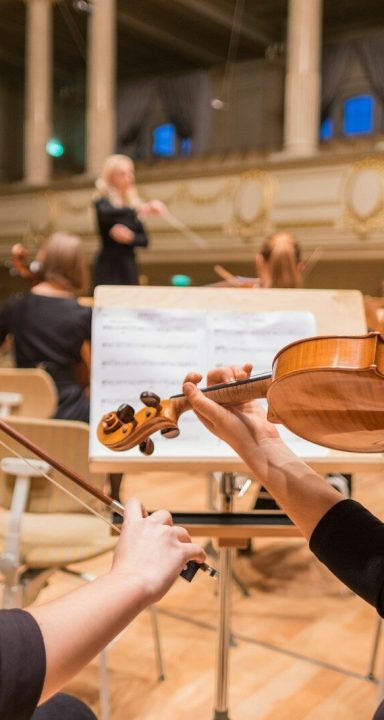 orchestra playing their piece